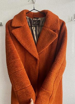 Стильное удлиненное женское пальто4 фото