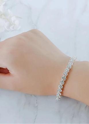 Тренд жіночий сріблястий сяючий браслет на руку кристали3 фото
