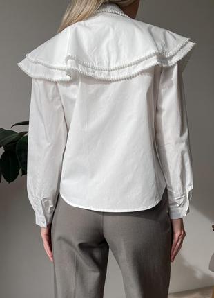 Блуза с объемным воротником и бусинами3 фото