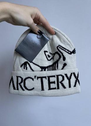 Шапка arcteryx бежева