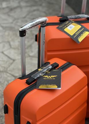 Якісна валіза ,польша ,противоударний пластик ,усі розміри ,кодовий замок ,wings5 фото