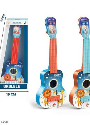 Іграшка гітара арт. 6818e 2 кольор, на планшетці 41*19*5, 5 см tzp166