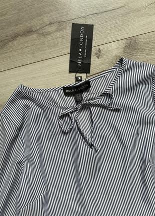Блуза с рукавами-колокольчиками в полоску с баской mela london5 фото