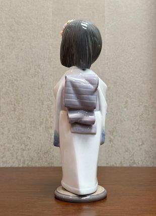 Фарфорова статуетка lladro «несуча квіти».4 фото