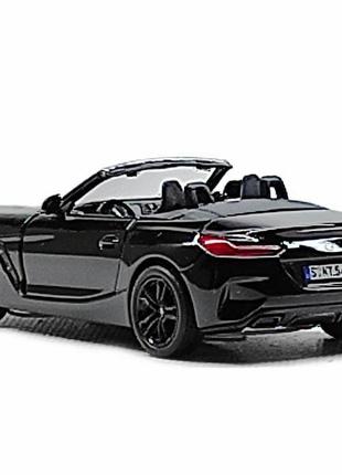 Машинка kinsmart bmw z4 kt5419w чорний3 фото
