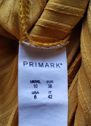 Помаранчевий комбінезон міді на бретелях від primark7 фото