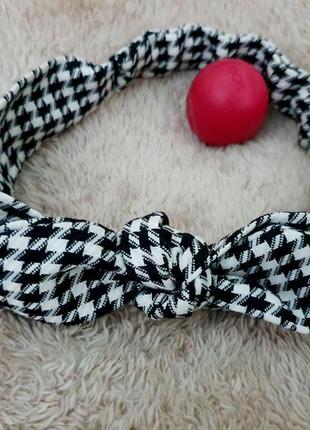 Жіноча повязка-бант на голову.