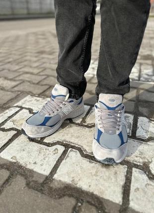 Чоловічі кросівки сірі з синім new balance 2002r light grey blue fur7 фото