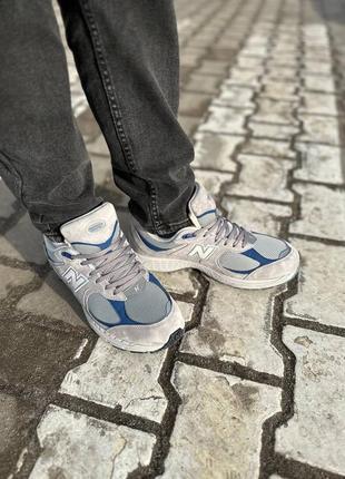 Чоловічі кросівки сірі з синім new balance 2002r light grey blue fur5 фото