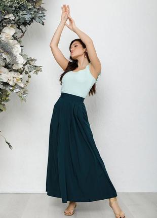 Зеленая длинная расклешенная юбка, размер s4 фото