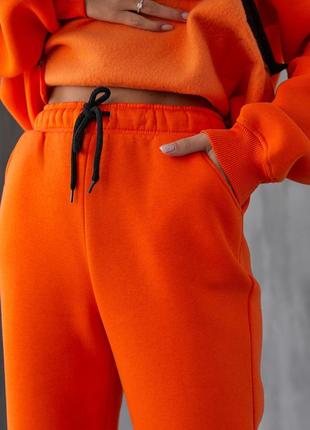 Спортивный костюм женский 698 оранжевый 38р4 фото
