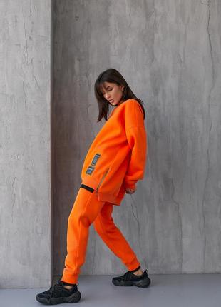 Спортивный костюм женский 698 оранжевый 38р2 фото