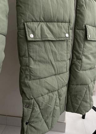 Теплая куртка цвета хаки