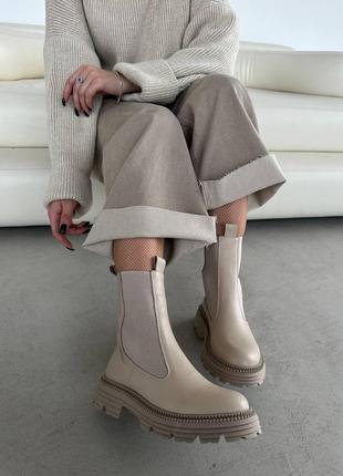 Стильні бежеві високі зимові челсі черевики жіночі на резинках