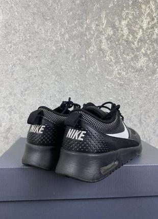 Жіночі чорні кросівки nike air max thea5 фото