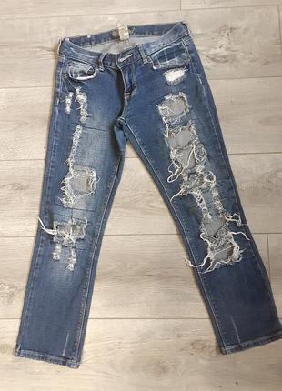 Рвані джинси