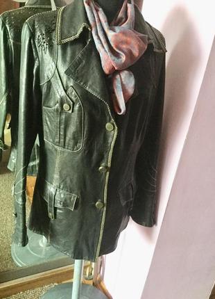 Шикарная кожаная длинная куртка на 48размер1 фото
