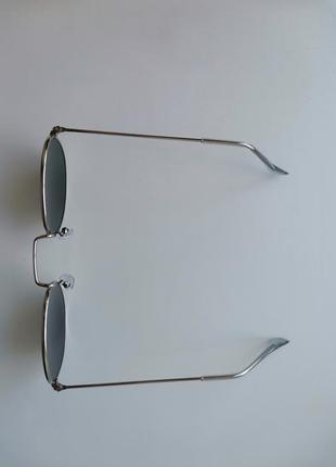 Сонцезахисні окуляри в металевій оправі.3 фото