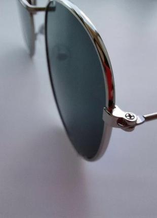Сонцезахисні окуляри в металевій оправі.4 фото