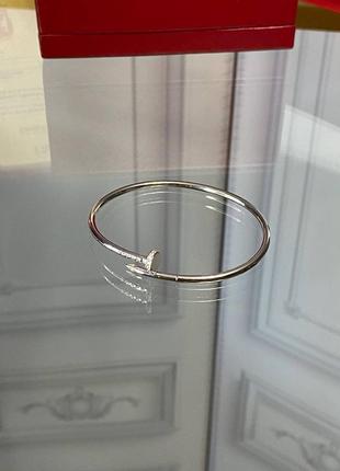 Серебряный браслет тонкий гвоздик в стиле cartier с камушками