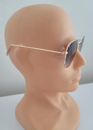 Солнцезащитные очки прямоугольные золотые3 фото