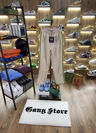 Штани palm angels beige exodus track pants