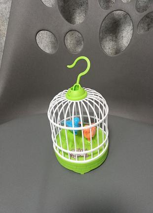 Будинок,клітка с птахами,співають птахи, іграшка