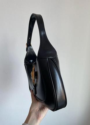 Очень красивая черная кожаная сумочка от бренда gucci7 фото