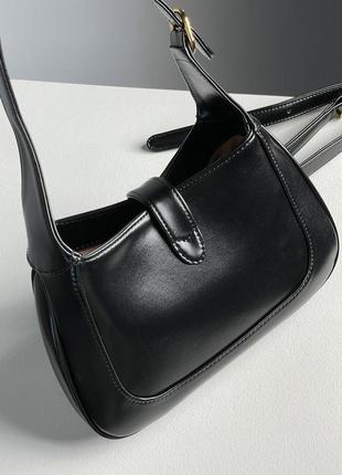 Очень красивая черная кожаная сумочка от бренда gucci5 фото
