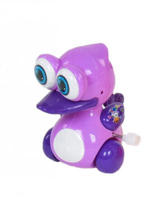 Заводна іграшка "каченя" 6630  (фіолетовий)1 фото