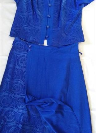 Синий костюм с юбкой и кофтой с коротким рукавом2 фото