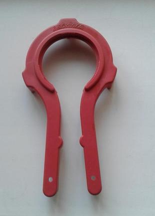 Ключ-відкривачка пластиковий для гвинтових євро кришок дарівка1 фото