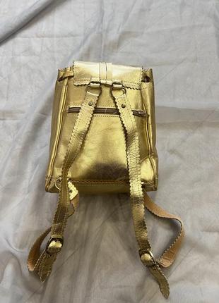 Шкіряний золотий рюкзак2 фото