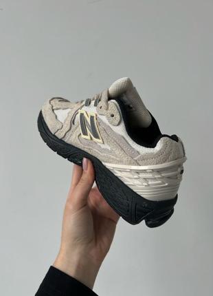 Трендові жіночі кросівки new balance 1906d protection pack beige black бежеві з чорним7 фото