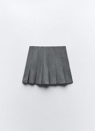 Короткая юбка с бантовыми складками7 фото