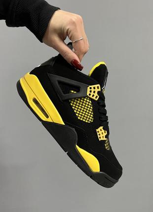 Шикарные мужские кроссовки nike air jordan 4 retro thunder чёрные с жёлтым