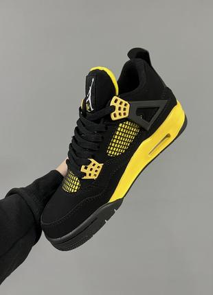 Шикарные мужские кроссовки nike air jordan 4 retro thunder чёрные с жёлтым8 фото