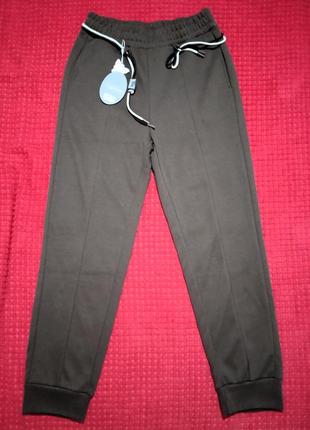 Коричневые брюки