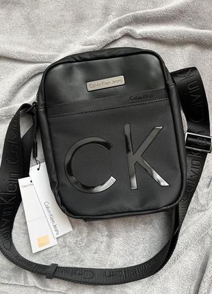 Стильная, удобная мужская черная сумка calvin klein jeans