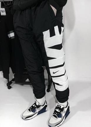 Спортивні нейлонові штани nike з підкладкою чорні з надписом найк s, m, l, xl