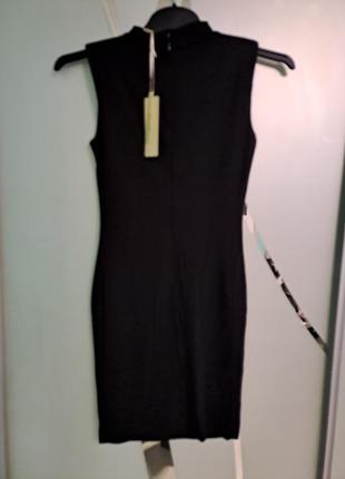 Коктейльное черное платье с сеточкой по переду и подплечниками 8 размера3 фото