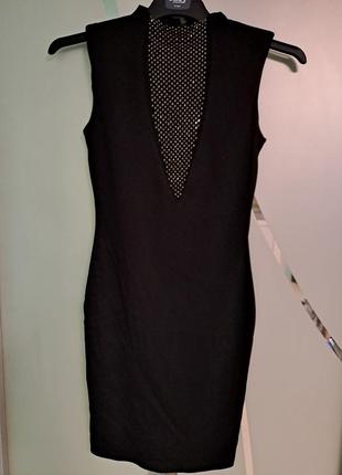Коктейльное черное платье с сеточкой по переду и подплечниками 8 размера1 фото