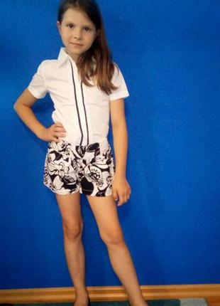 Нарядные модные фирменные шорты девочке3 фото