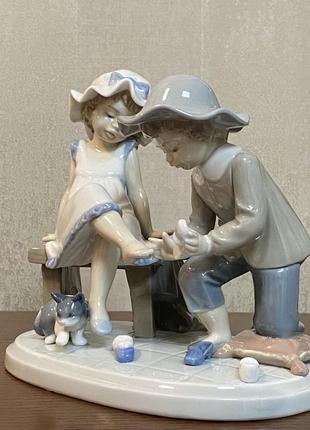 Порцелянова статуетка lladro «примір ось це».