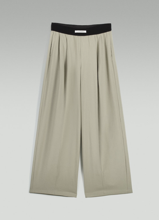Стильные широкие брюки с карманами6 фото
