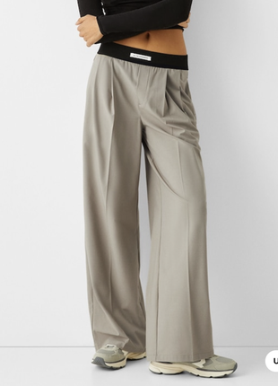 Стильные широкие брюки с карманами4 фото