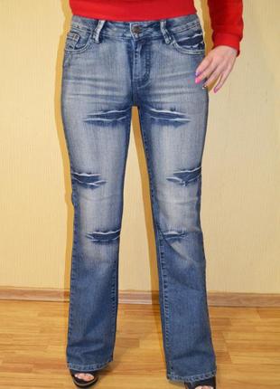 Синие джинсы с напылением варенка