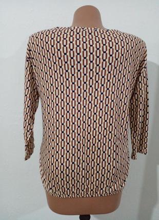 Трикотажная блуза в геометрический принт3 фото