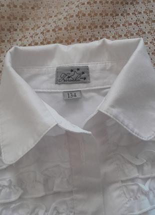 Нарядная белая школьная рубашка блузка с оборками звездочка4 фото