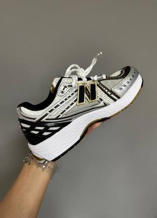 Кроссовки new balance 1906r gold / silver / black grid premium7 фото